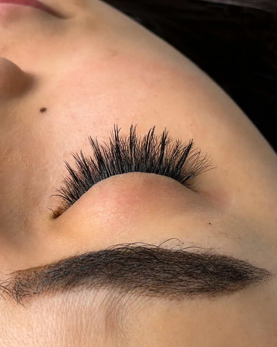 Kim Kardashian lash extensions in Dubai — dense, wispy lash line at AZIZAM beauty salon